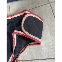 couvre reins imperméable bleu et rouge