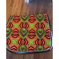 Ensemble composé d’un tapis, d’un bonnet et d’un sac de pansage