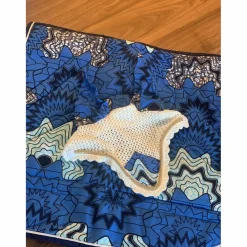 Ensemble composé d’un tapis et d’un bonnet
