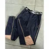 pantalon bleu marine et orange fouganza