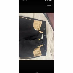 Pantalon noir et beige