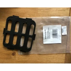 Plaque restrictive grrenguard