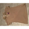 polo beige drapeaux