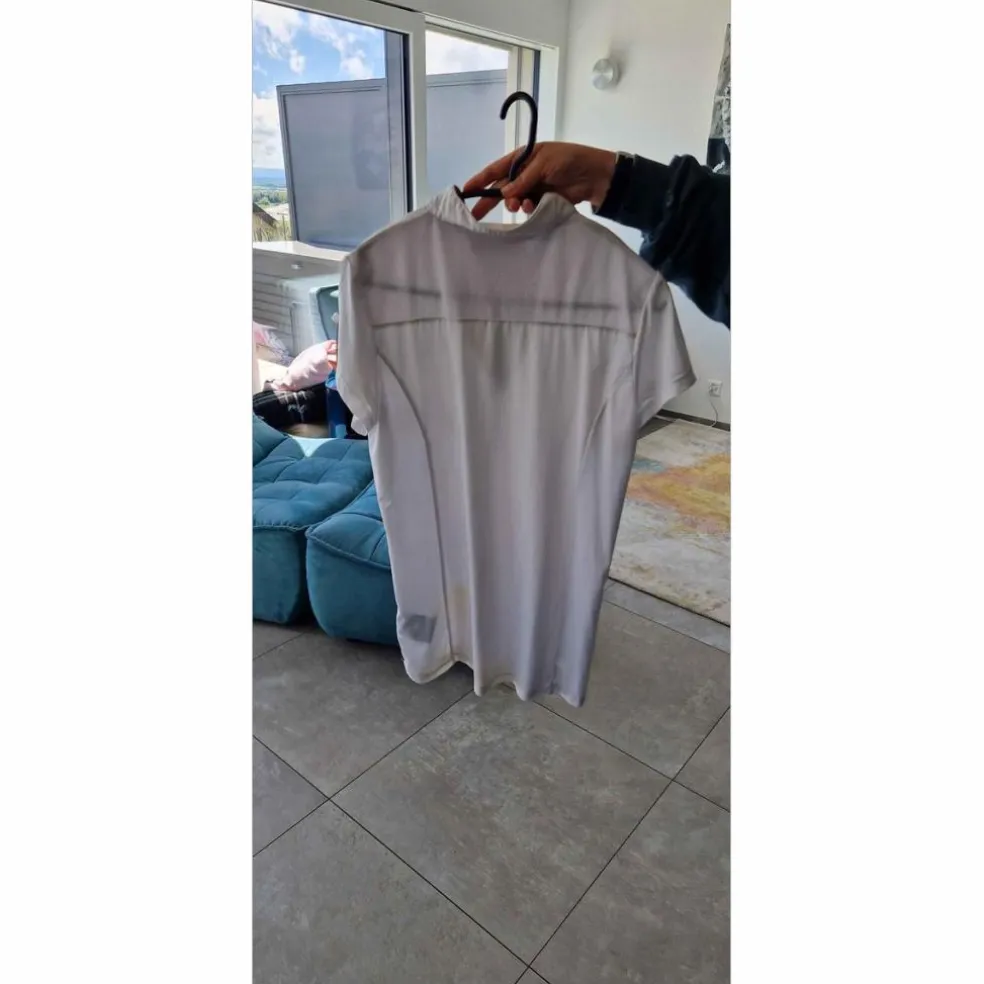 polo blanc taille L t40 Félix Buhler