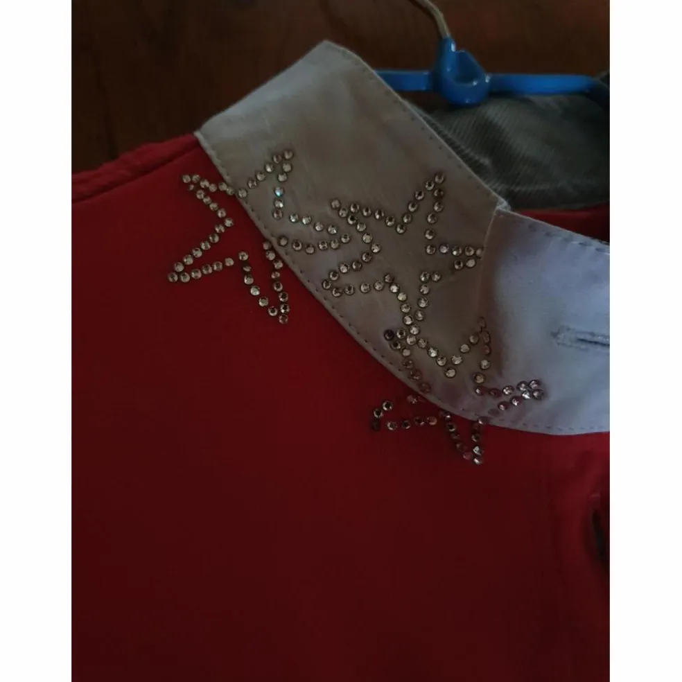 Polo concours ANIMO couleur Corail