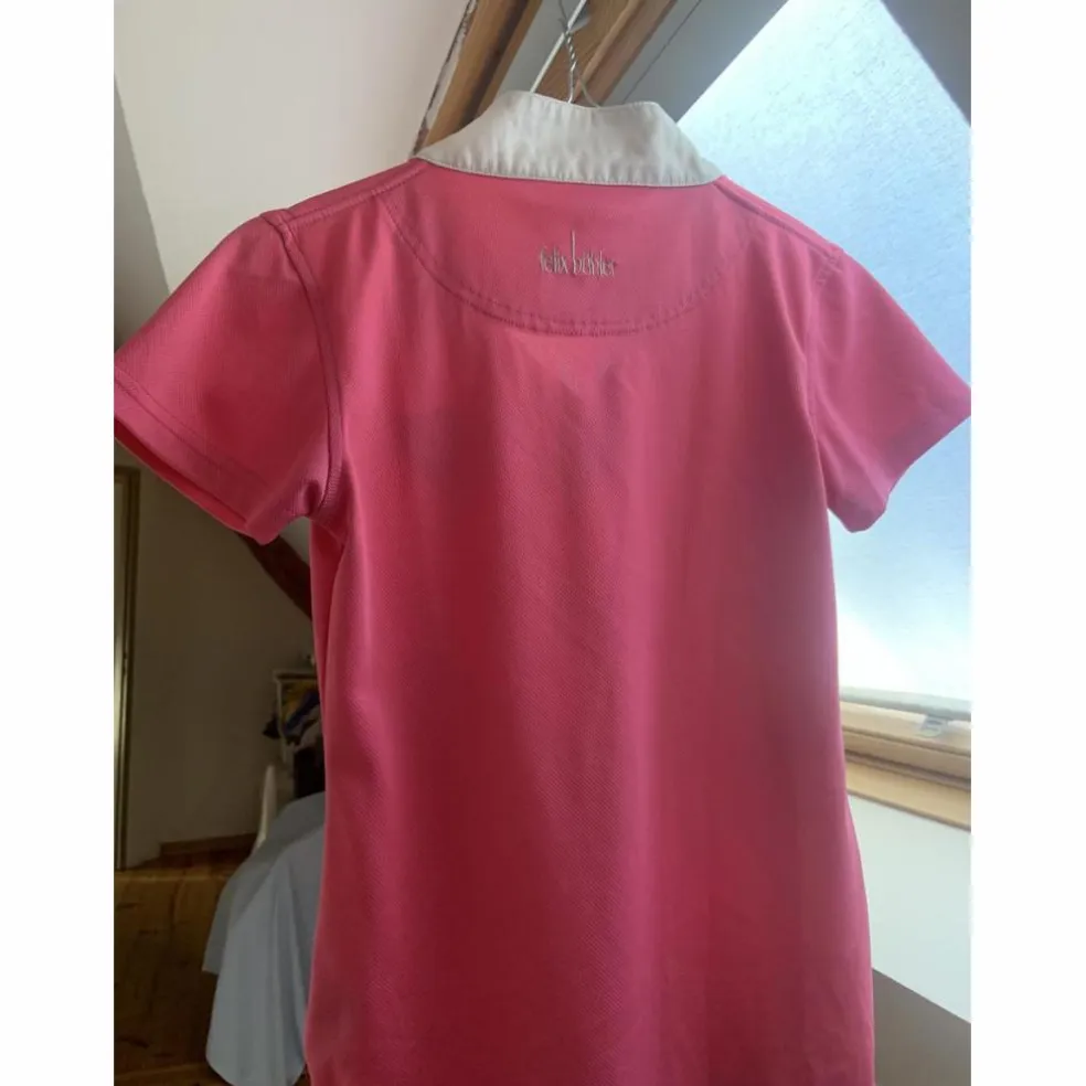 polo de concours rose