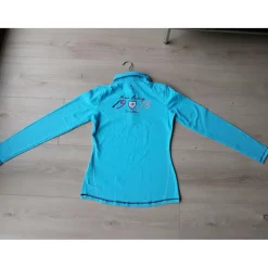 Polo manches longues turquoise T.38