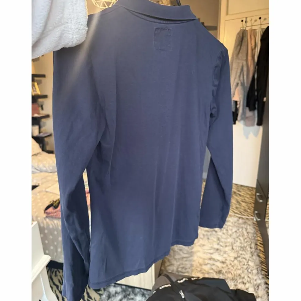 Polo samshield bleu marine taille S
