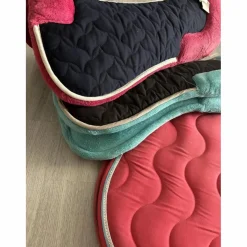 Tapis de selle et amortisseur