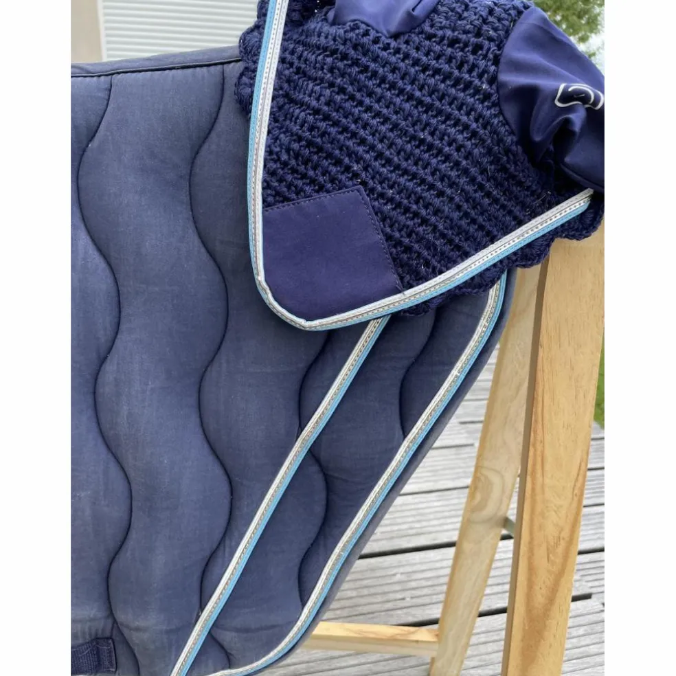 Tapis et bonnet de concours