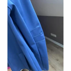 veste de concours bleue