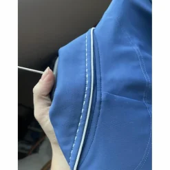 veste de concours bleue